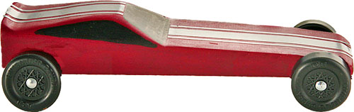 Extended wheelbase Funnycar painted red.
