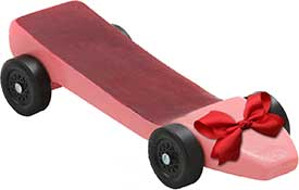Pinewood derby block painted to look like a shoe.